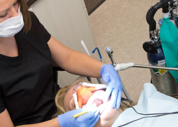 Dentist Examining Patients